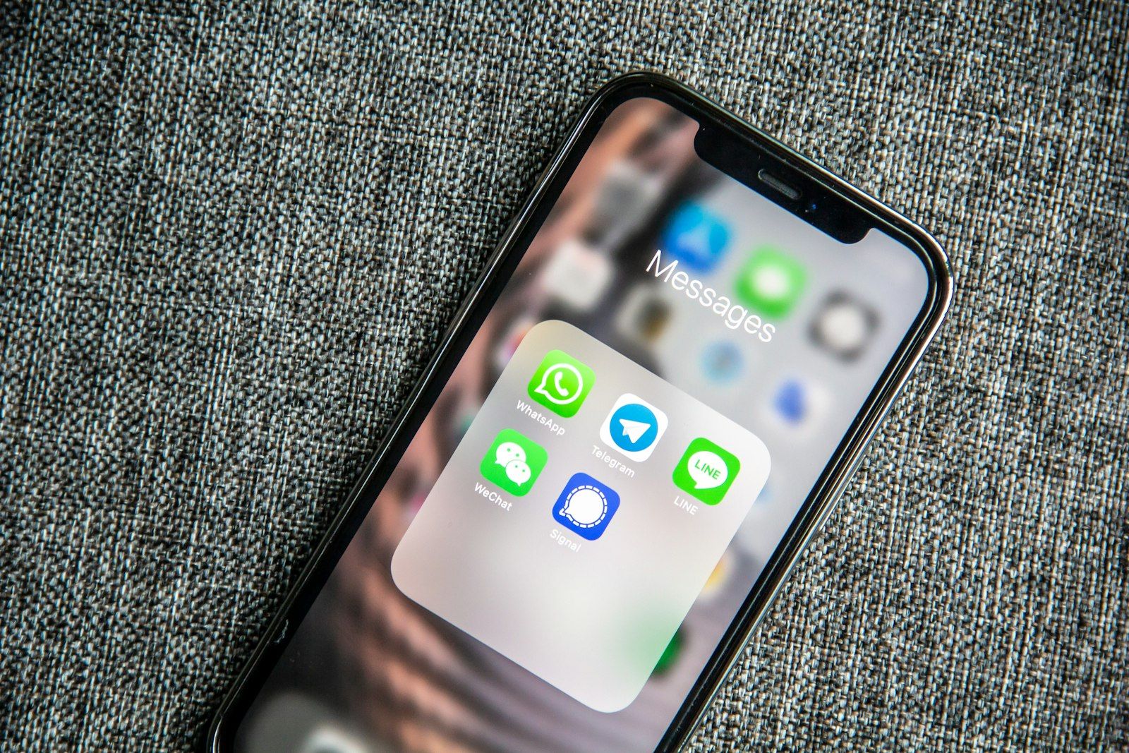Smartphone showing chat and messaging apps